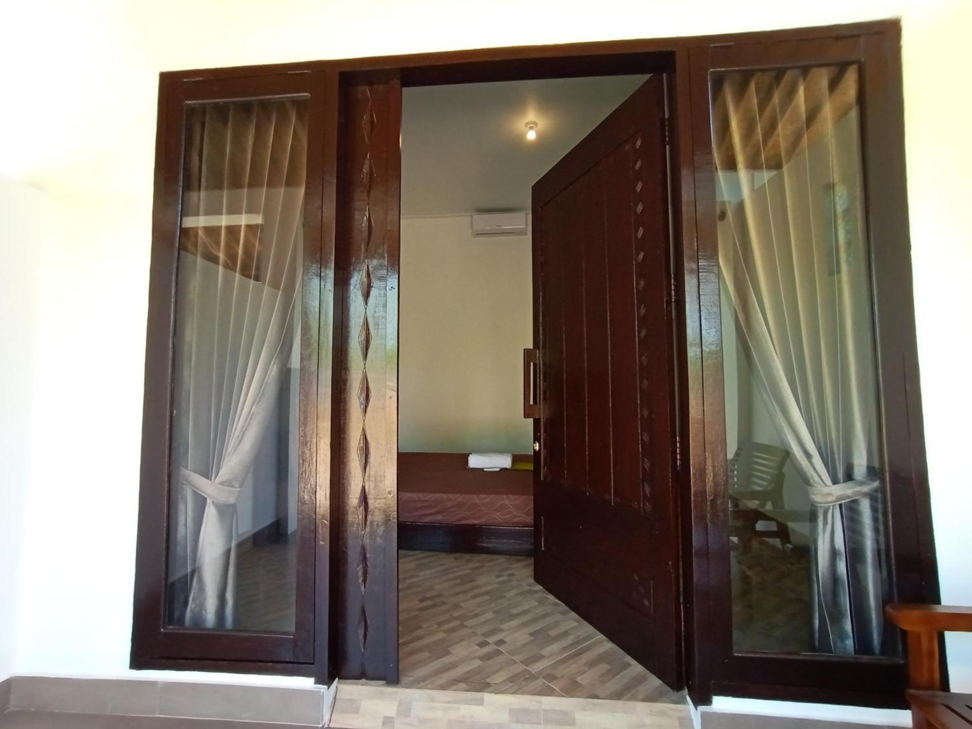 Barrel Homestay Areguling Kuta  Habitación foto